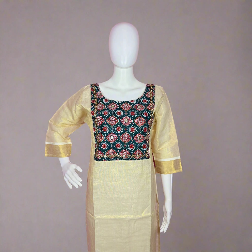 Traditional outfit with a patterned top and beige