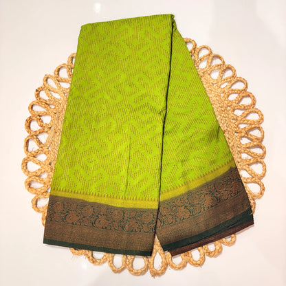Leaf Green Woven Saree with Dark Green Jacquard Border – Elegant Festive & Office Wear