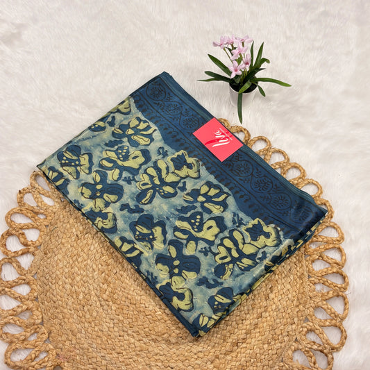 Blue Gajji silk saree with Lakripatta Multani floral and diamond prints, ornate border bands, zari pallu, and matching blouse piece