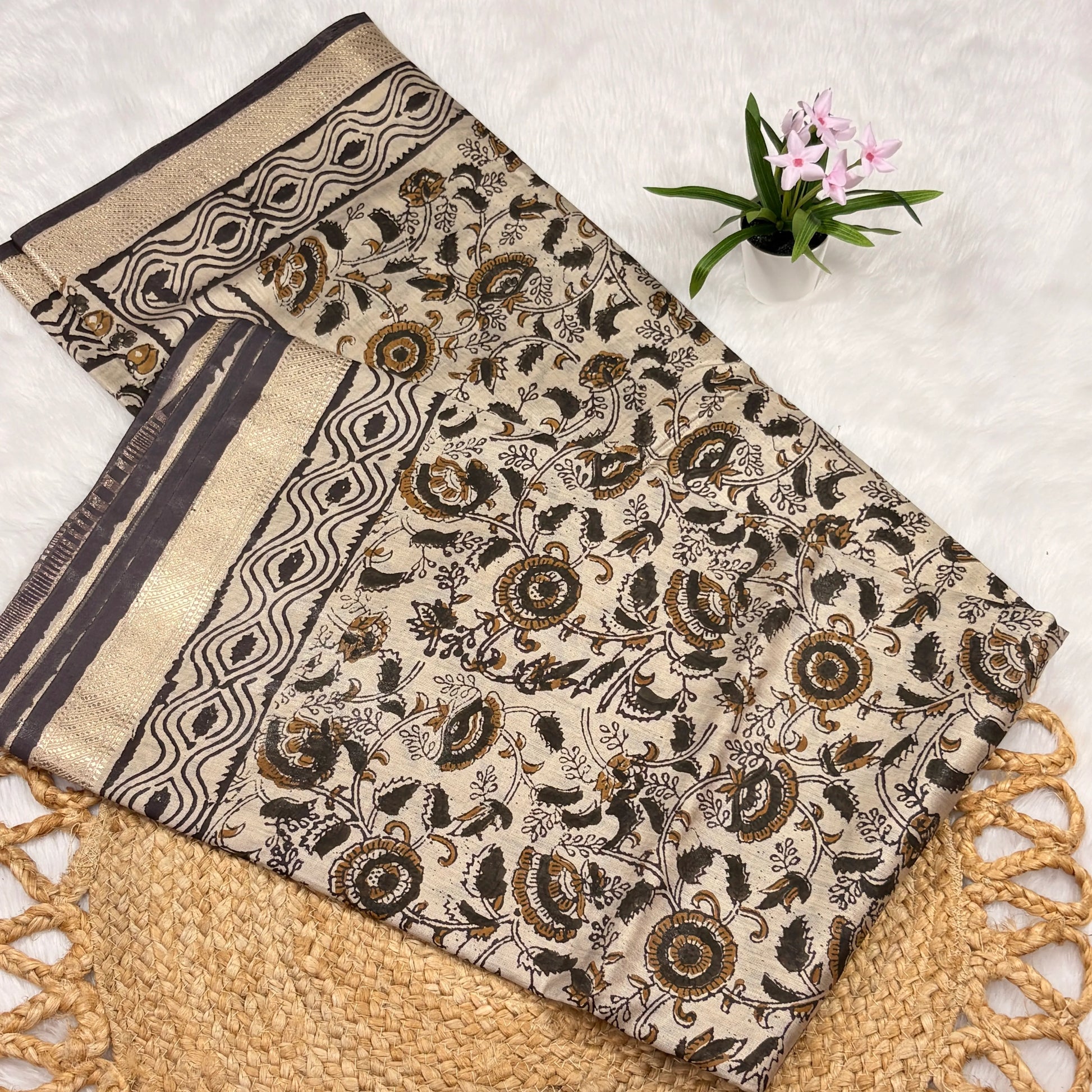 Decorative fabric with intricate patterns on a textured surface