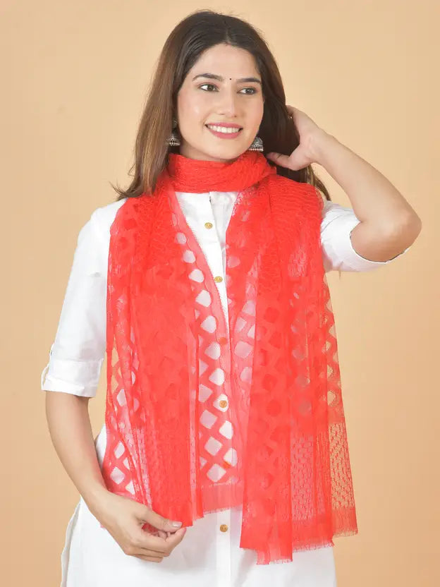 Woman wearing a red scarf with a white background