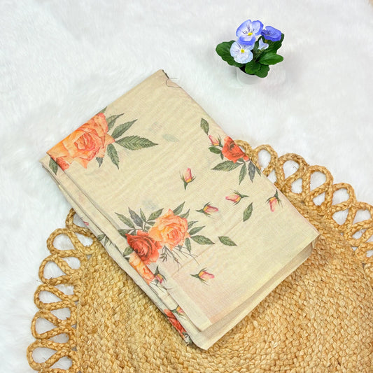 Floral notebook on a textured surface with a small plant in the background