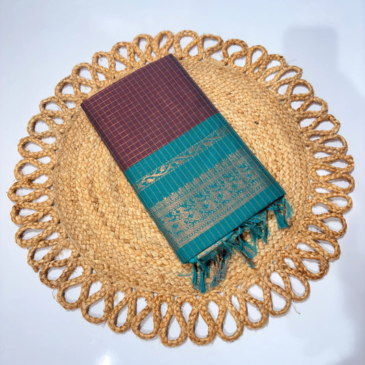 Sari on a decorative woven placemat with a white background