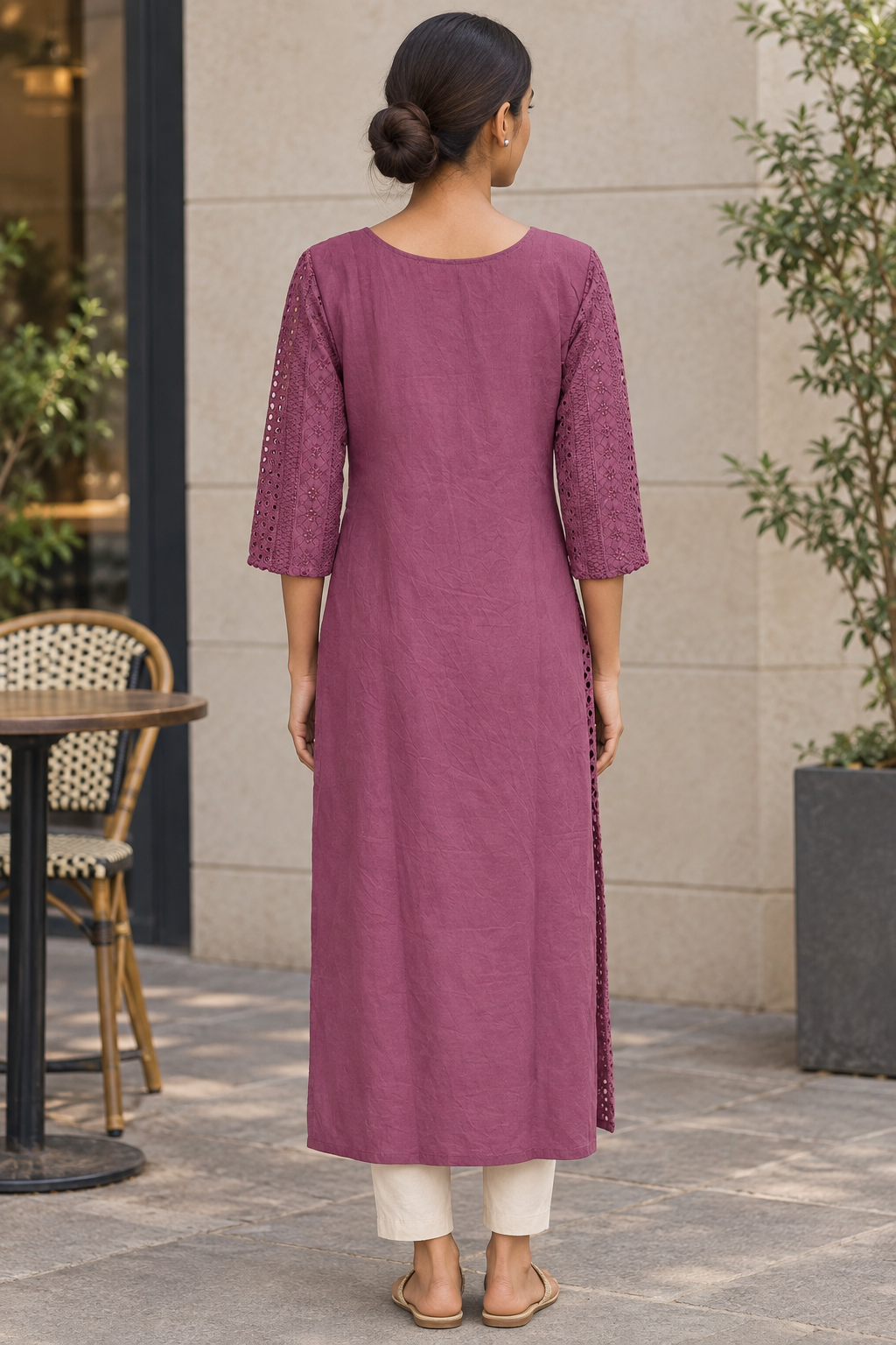 Back view of mauve kurti outside a café