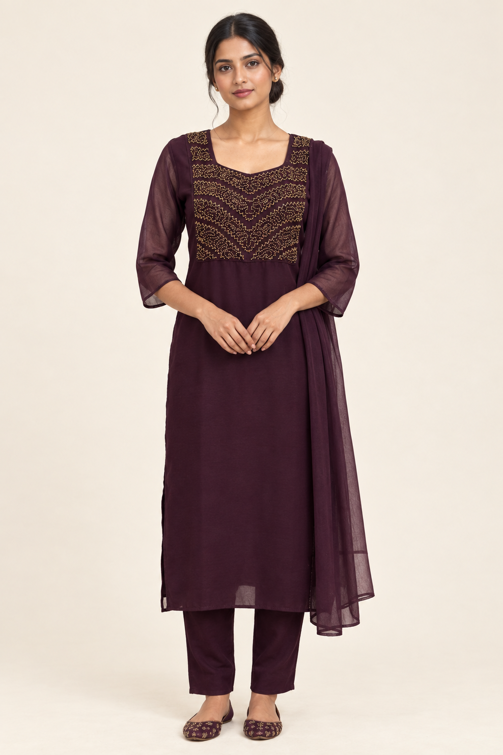 Front view of dark plum embroidered kurta set