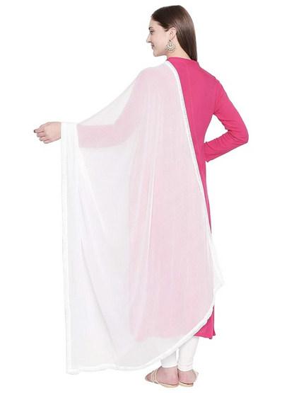 Woman wearing a pink and white outfit with a white dupatta on a white background