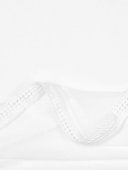 Close-up of a white fabric texture