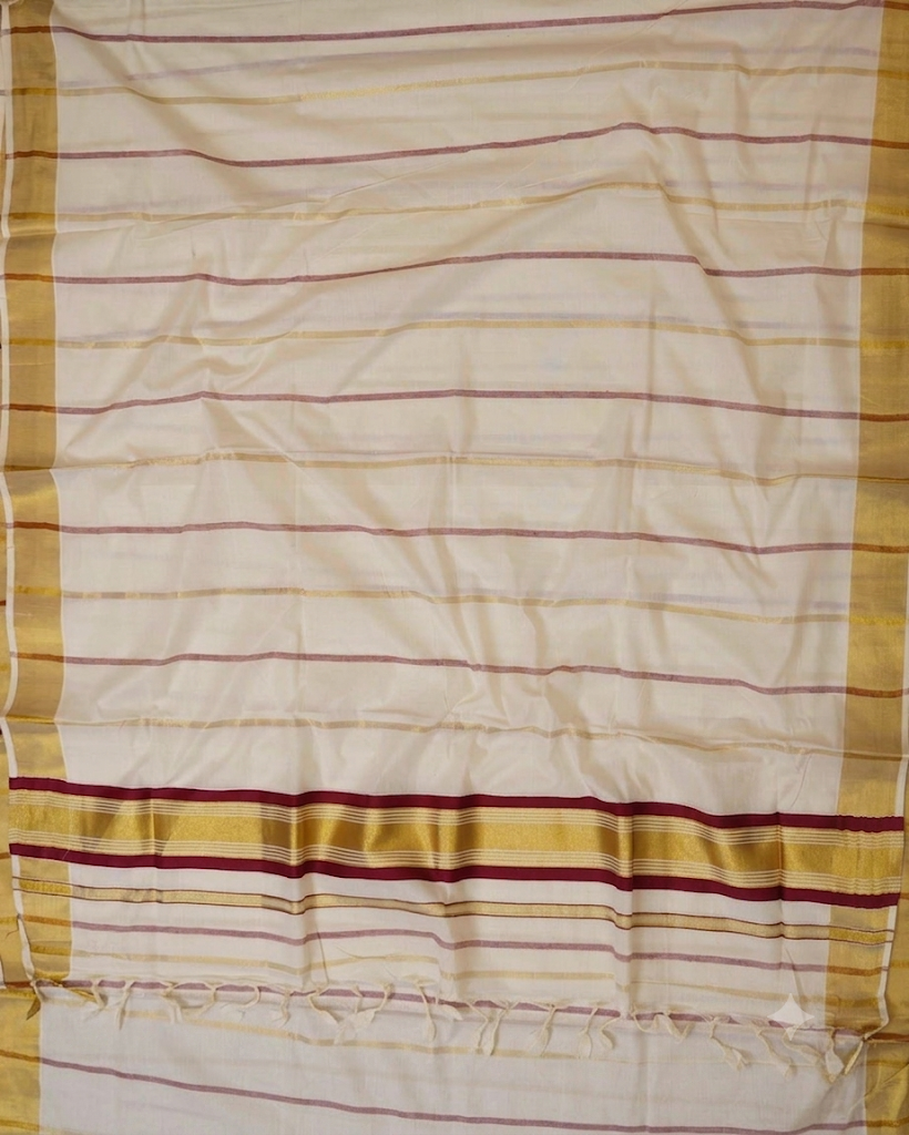 Off-white Kerala cotton Kasavu saree with multicolour horizontal stripes in maroon, gold and mauve, broad golden zari border and matching blouse piece – ideal for Onam, festivals and office wear