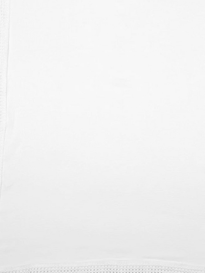 Close-up of a white fabric texture